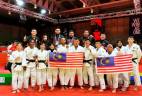 Fazlia (front, second from right) with Malaysia’s judo team during the SEA Games 2019 in the Philippines.