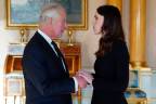 King Charles III meets with New Zealand Prime Minister Jacinda Ardern, during a meeting of Prime Ministers of the Realms, in the 1844 Room in Buckingham Palace in London/AFPPix