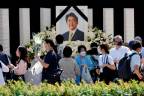 Mourners lay flowers and pay their respects at the altar outside Nippon Budokan Hall, which will host a state funeral for former Prime Minister Shinzo Abe, in Tokyo, Japan/REUTERSPix
