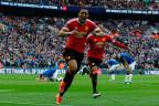 This file photo taken on April 23, 2016 shows Manchester United’s French striker Anthony Martial (C) as he celebrates after scoring their second goal during the English FA Cup semi-final football match between Everton and Manchester United at Wembley Stadium in London/AFPPix