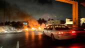 A picture taken on June 3, 2022, shows burning tyres blocking roads during overnight protests in the Libyan capital Tripoli. AFPPIX