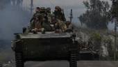 Ukrainian soldiers sit on infantry fighting vehicles as they drive near Izyum, eastern Ukraine on September 16, 2022, amid the Russian invasion of Ukraine. AFPPIX