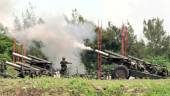 Taiwan military soldiers fire the 155-inch howitzers during a live fire anti landing drill in the Pingtung county, southern Taiwan on August 9, 2022. - AFPPIX