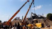 Rescuers use cranes to remove collapsed concrete roof of a detention center hit by air strikes in Saada, Yemen January 21, 2022. REUTERSpix