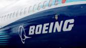 FILE PHOTO: The Boeing logo is seen on the side of a Boeing 737 MAX at the Farnborough International Airshow, in Farnborough, Britain, July 20, 2022. - REUTERSPIX