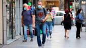 FILE PHOTO: People walk as they wear face masks to prevent the spread of the coronavirus disease (Covid-19) in Beirut, Lebanon July 28, 2020. REUTERSpix