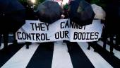 Abortion rights activists march behing a banner reading “You Cannot Control Our Bodies” near the US Supreme Court in Washington, DC, on June 24, 2022. AFPPIX