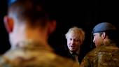 British Prime Minister Boris Johnson speaks with troops during a visit to the Royal Air Force Station in Waddington, Lincolnshire, on Feb 17. AFPpix