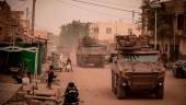 Griffon armoured vehicles from Operation Barkhane patrol the streets before the handover ceremony of the Barkhane military base to the Malian army in Timbuktu, on December 14, 2021. - AFPPIX