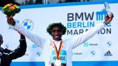 Kenya's Eliud Kipchoge celebrates on the podium with trophy after winning the Berlin Marathon and breaking the World Record. – REUTERSPIX