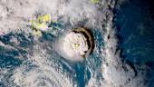 A grab taken from footage by Japan's Himawari-8 satellite and released by the National Institute of Information and Communications (Japan) on January 15, 2022 shows the volcanic eruption that provoked a tsunami in Tonga. - The eruption was so intense it was heard as loud thunder sounds in Fiji more than 800 kilometres (500 miles) away. AFPPix
