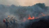 FILE PHOTO: Brazilian Institute for the Environment and Renewable Natural Resources (IBAMA) fire brigade members attempt to control hot points during a fire at the the Brazil's Amazon rainforest, in Apui, Amazonas state, Brazil, September 5, 2021. Picture taken September 5, 2021. REUTERSPIX