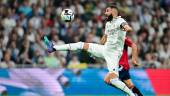 Real Madrid's French forward Karim Benzema controls the ball during the Spanish League football match between Real Madrid CF and CA Osasuna at the Santiago Bernabeu stadium in Madrid on October 2, 2022. - AFPPIX