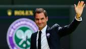 Swiss former tennis player Roger Federer waves during the Centre Court Centenary Ceremony, on the seventh day of the 2022 Wimbledon Championships at The All England Tennis Club in Wimbledon, southwest London, on July 3, 2022. AFPPIX