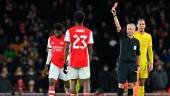 Referee Martin Atkinson (2nd Right) shows a red card to Arsenal's Ghanaian midfielder Thomas Partey during the English League Cup semi-final second leg football match between Arsenal and Liverpool at the Emirates Stadium, in London on January 20, 2022. AFPpix
