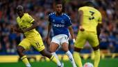 Everton's Nigerian midfielder Alex Iwobi (C) eyes the ball controled by Brentford's English defender Rico Henry (R) during the English Premier League football match between Everton and Brentford at Goodison Park. AFPPIX