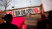 FILE PHOTO: Activists defending the rights of migrants hold a protest near Fort Bliss to call for the end of the detention of unaccompanied minors at the facility in El Paso, Texas, U.S, June 8, 2021. - REUTERSPIX