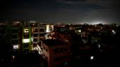 This photograph taken on October 4, 2022 shows a residential neighbourhood during a power blackout in Dhaka. At least 130 million people in Bangladesh were left without power on October 4 after a grid failure caused widespread blackouts, the government's power utility company said. - AFPPIX