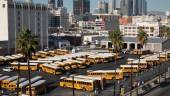 School buses stand idle as all Los Angeles city schools are shut down in reaction to a threat on December 15, 2015 in Los Angeles, California. AFPPIX
