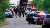 Law enforcement officers work at the scene where people were found dead inside a trailer truck in San Antonio, Texas, U.S. June 27, 2022. REUTERSPIX