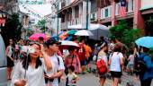 Tourists visit Armenian Street in George Town, situated within the core zone of the city’s Unesco Heritage Site. – BERNAMAPIX