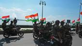 Indian Border Security Force (BSF) soldiers take part in a motorbike rally as part of the celebrations to mark the 75th anniversary of country's independence during 'Har Ghar Tiranga' campaign in Srinagar on August 10, 2022. - AFPPIX
