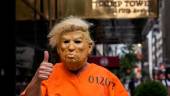 A protestor dressed up as former US President Donald Trump poses for photos outside Trump Tower in New York, New York, on August 10, 2022. AFPPIX