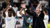 Real Madrid’s Brazilian forward Vinicius Junior (L) and Real Madrid’s Italian coach Carlo Ancelotti acknowledge the crowd at the end of the Spanish league football match between Real Madrid CF and Real Betis at the Santiago Bernabeu stadium in Madrid on May 20, 2022. AFPPIX