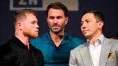Mexican boxer Saul “Canelo” Alvarez (L) and Kazakhstani boxer Gennady Golovkin (R), alongside boxing promotor Eddie Hearn (C), pose for photos during a press conference ahead of their fight for the undisputed super middleweight championship of the world, in Hollywood, California on June 24, 2022. AFPPIX