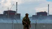 FILE PHOTO: A serviceman with a Russian flag on his uniform stands guard near the Zaporizhzhia Nuclear Power Plant in the course of Ukraine-Russia conflict outside the Russian-controlled city of Enerhodar in the Zaporizhzhia region, Ukraine August 4, 2022. REUTERSPIX