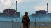 FILE PHOTO: A serviceman with a Russian flag on his uniform stands guard near the Zaporizhzhia Nuclear Power Plant in the course of Ukraine-Russia conflict outside the Russian-controlled city of Enerhodar in the Zaporizhzhia region, Ukraine August 4, 2022. - REUTERSPIX