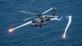 A U.S. Navy MH-60R Sea Hawk helicopter from the “Blue Hawks” of Helicopter Maritime Strike Squadron 78 fires chaff flares during a training exercise near the aircraft carrier USS Carl Vinson (CVN 70) in the Philippine Sea April 24, 2017. U.S. Navy/Mass Communication Specialist 2nd Class Sean M. Castellano/Handout via REUTERSpix