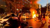 FILE PHOTO: A police motorcycle burns during a protest over the death of Mahsa Amini, a woman who died after being arrested by the Islamic republic’s “morality police”, in Tehran, Iran September 19, 2022. REUTERSPIX