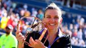 TORONTO, ON - AUGUST 14: Simona Halep of Romania celebrates her victory over Beatriz Haddad Maia of Brazil following the singles final of the National Bank Open, part of the Hologic WTA Tour, at Sobeys Stadium on August 14, 2022 in Toronto, Ontario, Canada. Vaughn Ridley/Getty Images/AFP