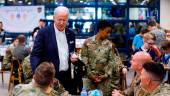 U.S. President Joe Biden has an ice cream as he greets the US troops during his visit to the Air Operations Center at Osan Air Base in Pyeongtaek, South Korea, May 22, 2022. REUTERSpix