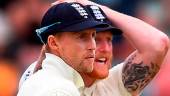 England captain Joe Root (left) and Ben Stokes on the third day of the fifth Ashes cricket Test match in Hobart. – AFPPIX