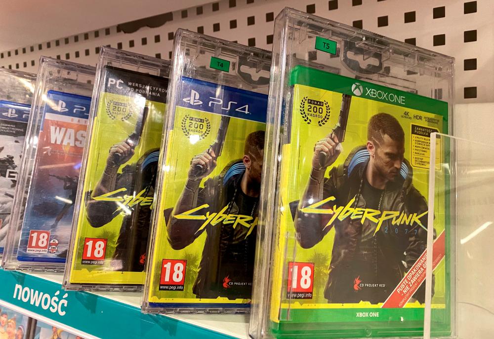 $!Boxes with CD Projekt’s game Cyberpunk 2077 are displayed in Warsaw, Poland, December 14, 2020. REUTERS/Kacper Pempel