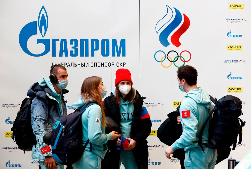 Russian speed skaters are seen before their departure for the Beijing 2022 Winter Olympics at Sheremetyevo airport in Moscow, Russia January 26, 2022. REUTERSPIX