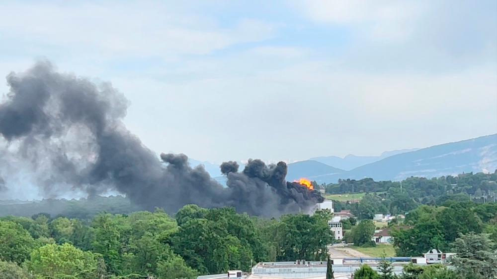 Smoke and flames rise after a fire broke out near Geneva airport, in Switzerland May 20, 2022 in this screen grab taken from a video obtained from social media and taken from Ferney-Voltaire, France. REUTERSPIX