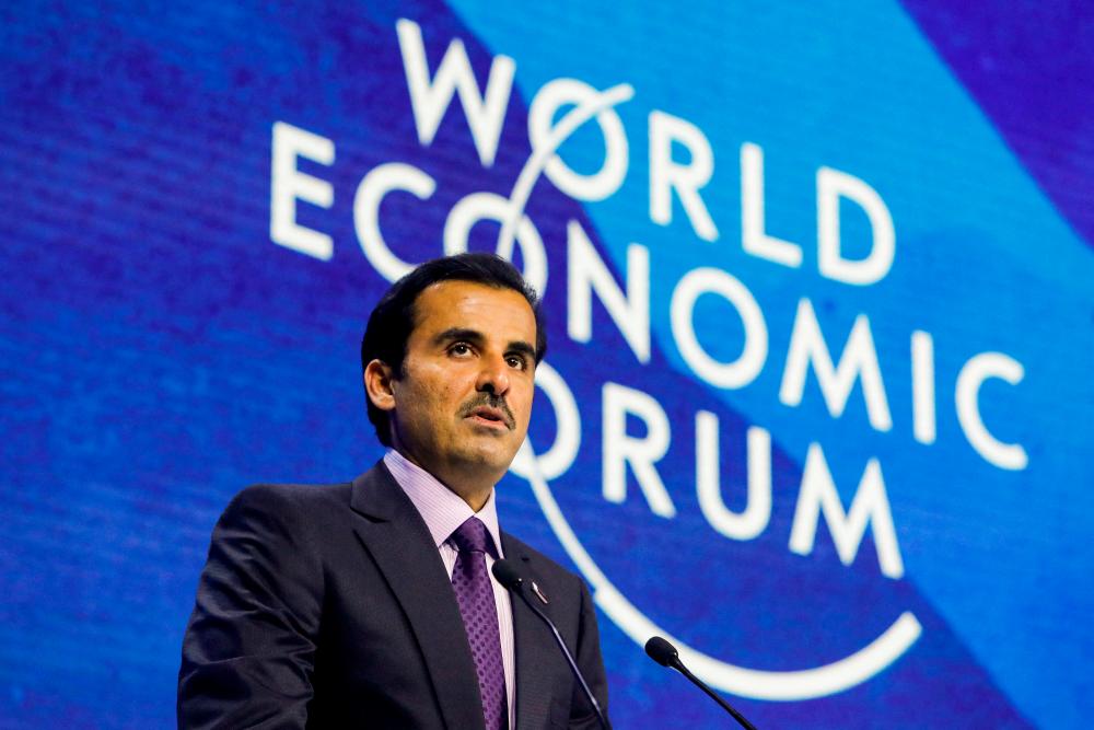 Qatar’s Emir Tamim Bin Hamad Bin Khalifa Al Thani addresses the delegates of the World Economic Forum (WEF) in Davos, Switzerland May 23, 2022. REUTERSPIX