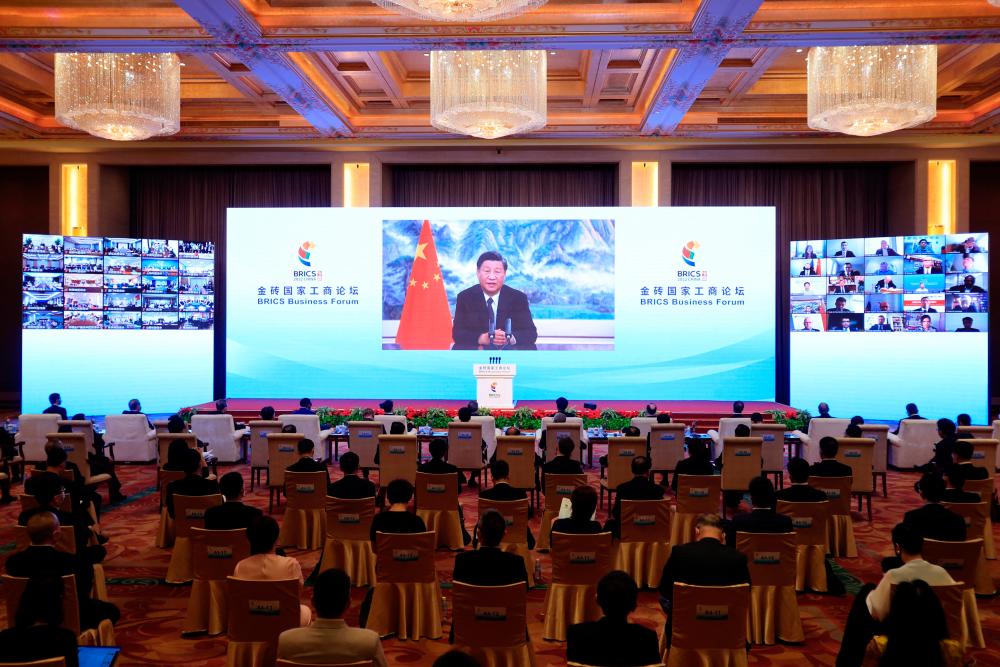 Chinese President Xi Jinping delivers a speech via video at the opening ceremony of the BRICS Business Forum, in Beijing, China June 22, 2022. REUTERSPIX