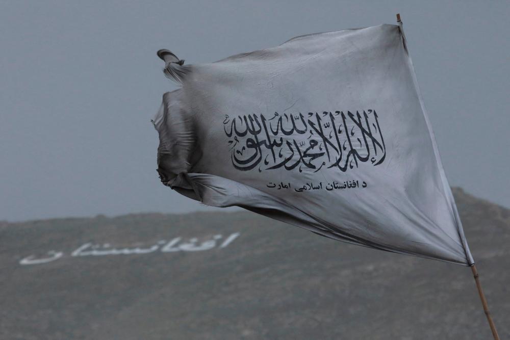 FILE PHOTO: The Taliban flag is seen in a marketplace in Kabul, Afghanistan, May 10, 2022. REUTERSPIX
