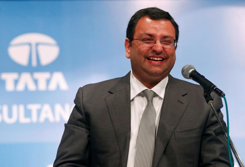 FILE PHOTO: Cyrus Mistry, chairman of Tata Group, smiles during the Tata Consultancy Services Ltd. (TCS) annual general meeting in Mumbai June 27, 2014. REUTERS/Stringer (INDIA - Tags: BUSINESS)/File Photo