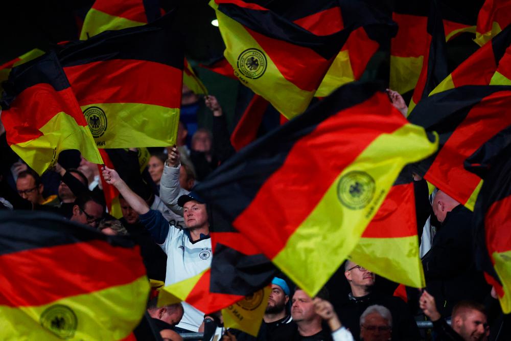 Soccer Football - UEFA Nations League - Group C - England v Germany - Wembley Stadium, London, Britain - September 26, 2022 Germany fans display flags inside the stadium before the match REUTERSPIX