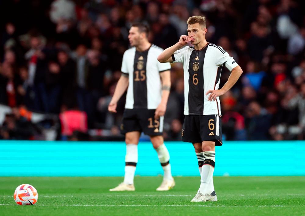 Soccer Football - UEFA Nations League - Group C - England v Germany - Wembley Stadium, London, Britain - September 26, 2022Germany's Joshua Kimmich reacts after England's Harry Kane scored their third goal - REUTERSPIX