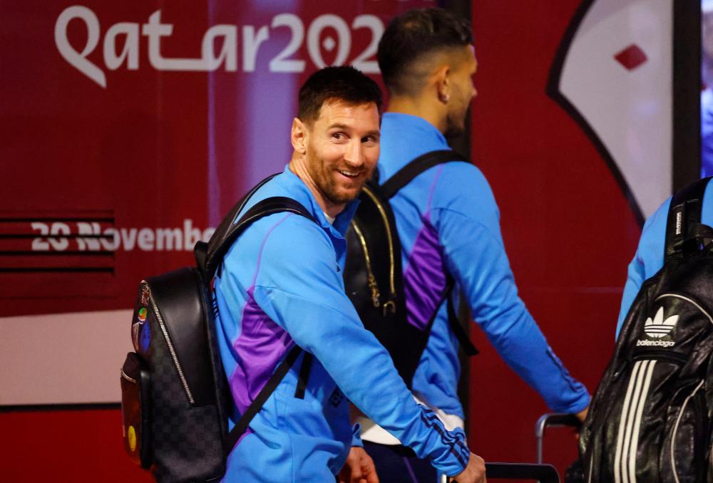 $!Messi and team arrives in Doha. – REUTERSPIX