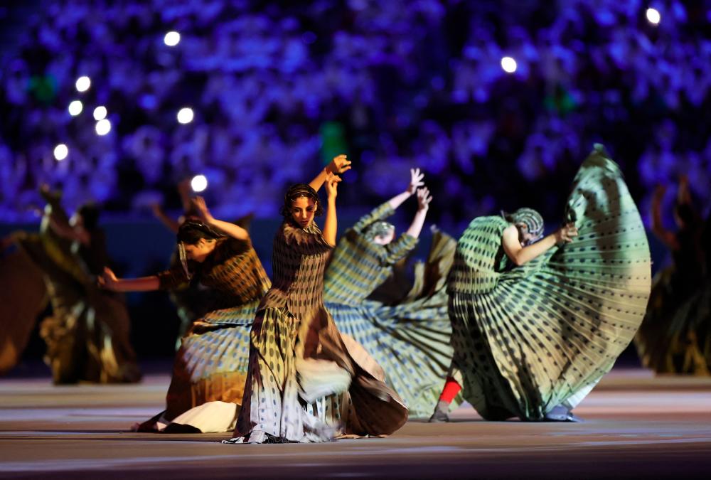 $!Dancer going through their routine during the opening ceremony. – REUTERSPIX