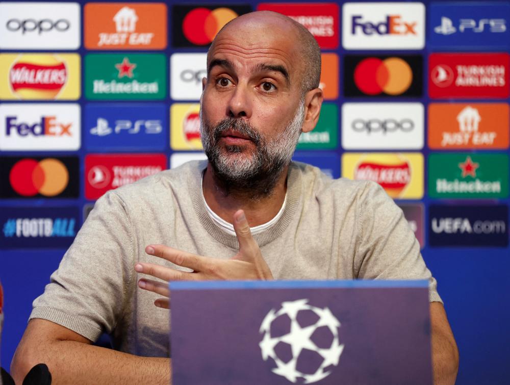 Football - Champions League - Manchester City Press Conference - Etihad Campus, Manchester, Britain - September 18, 2023Manchester City manager Pep Guardiola during the press conference - REUTERSPIX