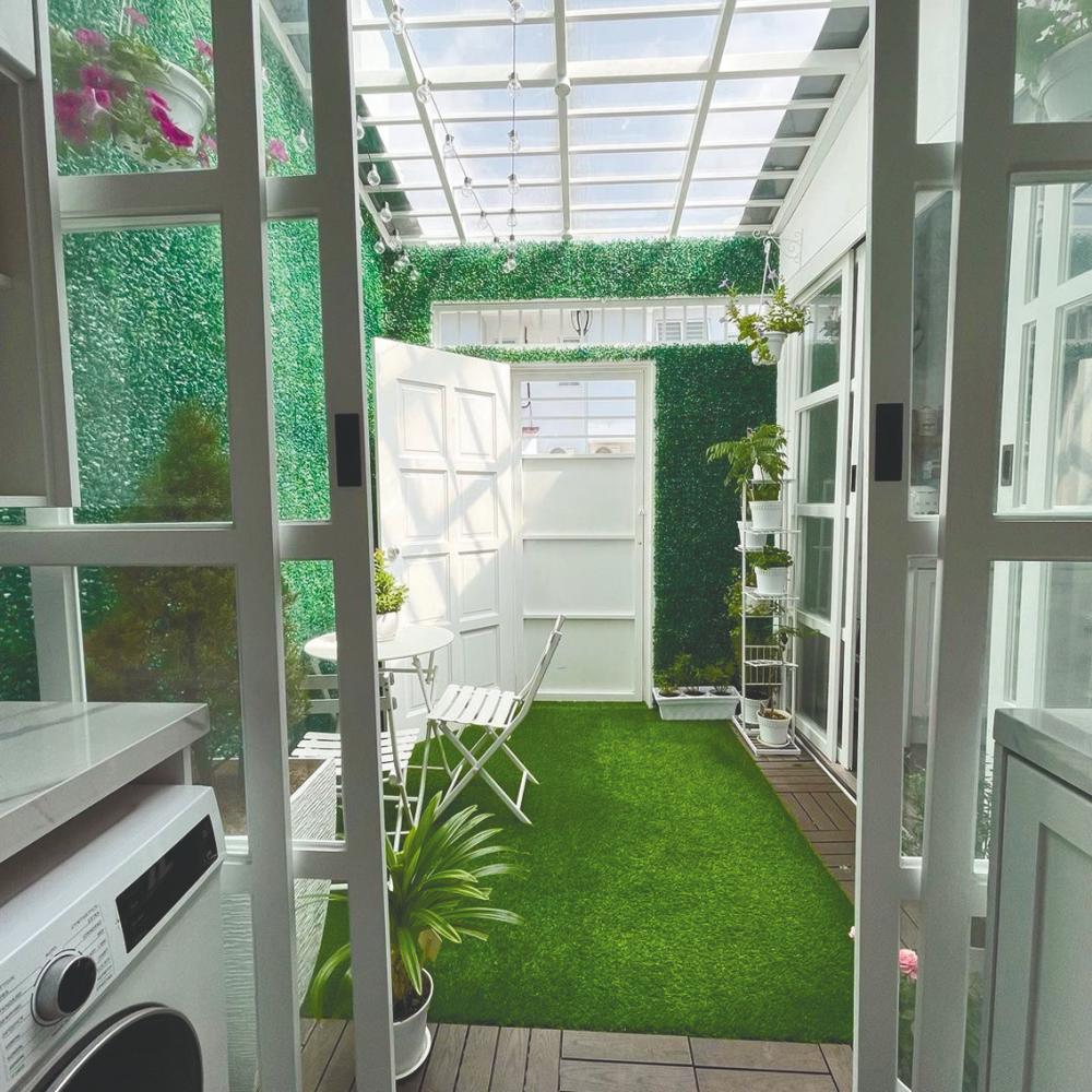 A view of the indoor garden from the laundry room.