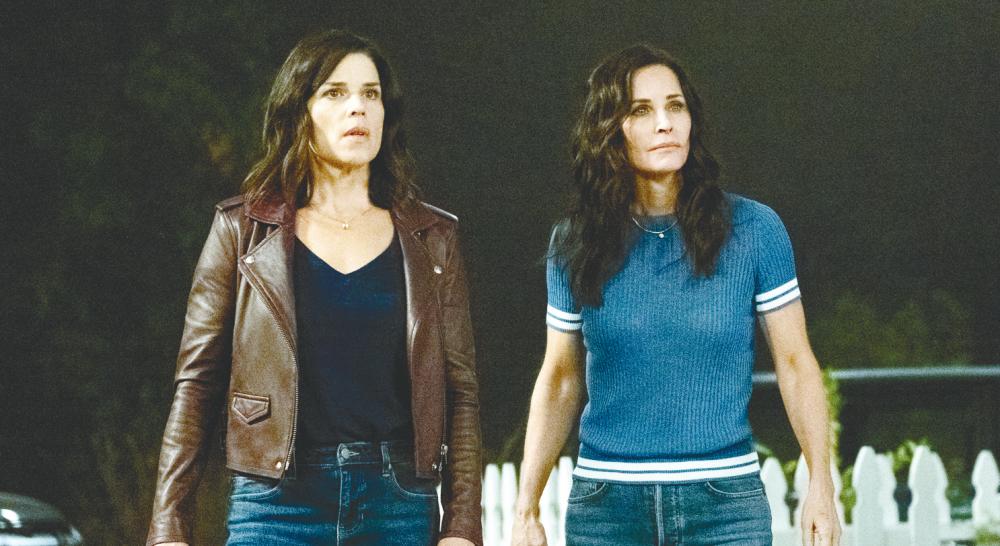$!Neve Campbell (“Sidney Prescott”), left, and Courteney Cox (“Gale Weathers”) back for another Scream movie.